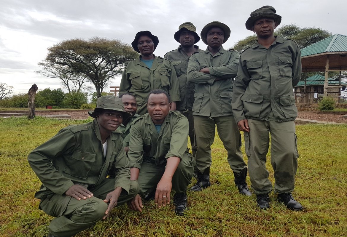 Ikona village game scouts gathered in the bush